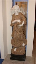 Life size solid marble Roman lady.