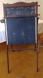 Antique chalkboard desk with picture scroll