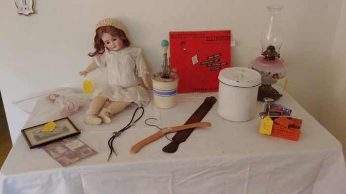 kerosene lamp, small butter churn, leather shaving strap, ACE stapler in original box, (Queen Louise doll is still for sale, but is not on location...we are asking $250)