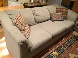 Love Seat and Pillows and Rugs.