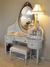 Very inviting antique French dressing table minus its original mirror but even more clever with the French style ribbon mirror.