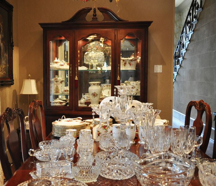 A view toward the Thomasville lighted cabinet with a collection of Royal Albert Old Country Roses specialty pieces, etc.