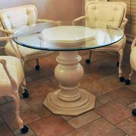 Is this not a terrific table.  I have the table and chairs priced separately with one price if you want it all.  It can be very glamorous with another style of chairs, but these are certainly nice.