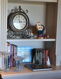 Western books, Shannon crystal candlesticks, working contemporary clock, and 1 of the collection of Anatoly Turov 1980s hand painted ceramics
