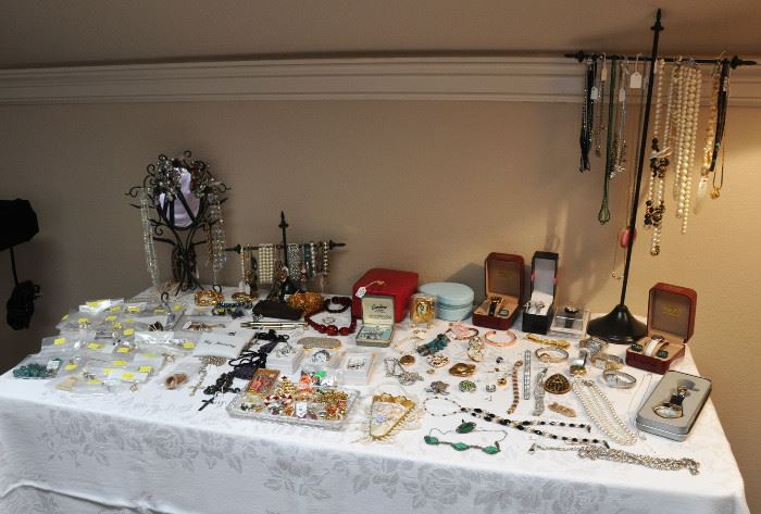 Costume jewelry, new watches in the box, holiday pieces, there is lots of bling.
