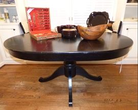 Black painted pedestal dining table