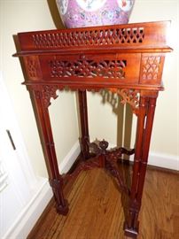 Chinese Chippendale stand with pierced carving and bamboo style legs