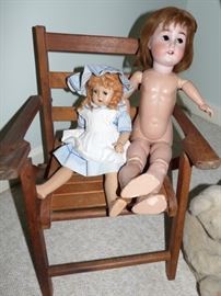 Vintage Dolls in vintage child's wooden chair