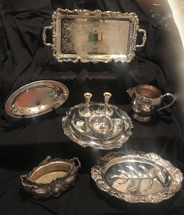 lots of silver-plate serving pieces 