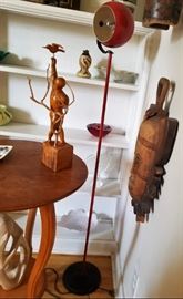 cool red lamp with primitive items