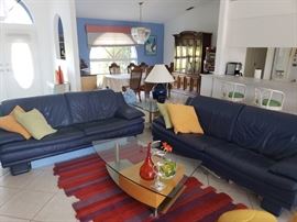 MODERN LEATHER SOFAS AND COFFEE TABLE