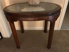 Oval glass top end table