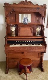 Antique pump organ and stool