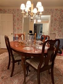 Thomasville Dining room furniture.  Table with 6 chairs and one leaf