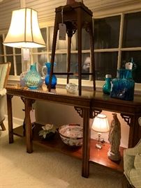 Beautiful sofa table.  Collection of signed and dated Blenko glass. 