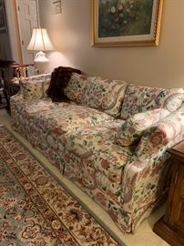 Beautiful tuxedo styled sofa.  Fabric in great shape.  Large area rug.