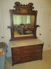 Antique Victorian Bedroom Set, Circa 1875, walnut with burl veneer, ornate floral carving, includes bed, dresser with mirror and commode, dresser and commode have marble tops