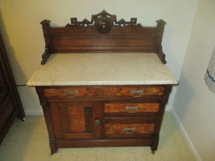 Antique Victorian Bedroom Set, Circa 1875, walnut with burl veneer, ornate floral carving, includes bed, dresser with mirror and commode, dresser and commode have marble tops