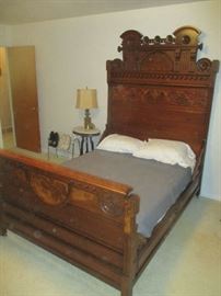 Antique Victorian Bedroom Set, Circa 1875, walnut with burl veneer, ornate floral carving, includes bed, dresser with mirror and commode, dresser and commode have marble tops