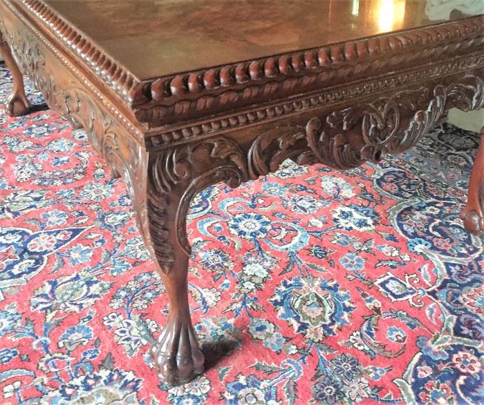 this is part of a three-piece carved walnut coffee table w/ pair end tables