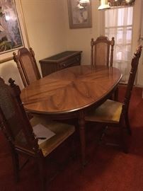 Dining Table and 6 chairs, all padded seats in excellent condition, has 2 additional leaves and padded cover for protection