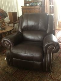 One of two nice leather arm chair recliner