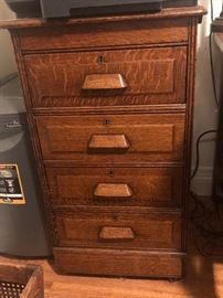 Very small antique file cabinet