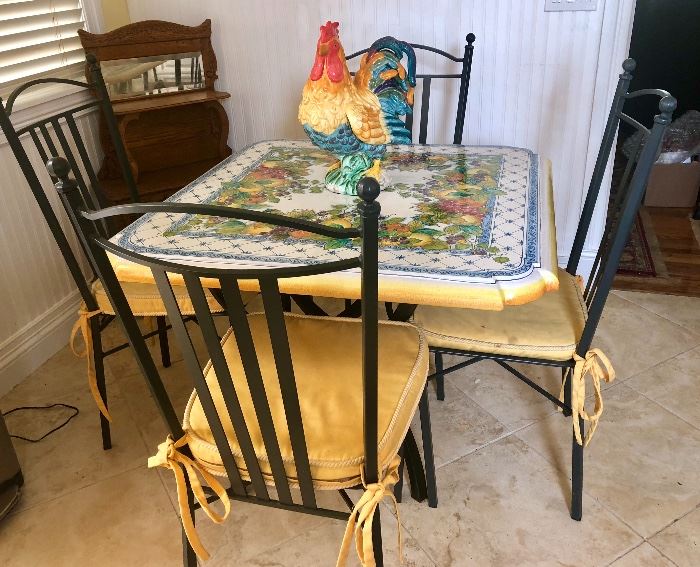 Italian enameled metal kitchen table with four iron chairs