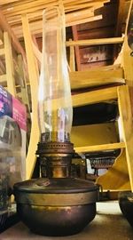 Antique Aladdin oil lamp with original wall bracket