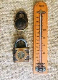 Antique padlocks and vintage outdoor thermometer