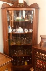 Bowed glass antique china display cabinet