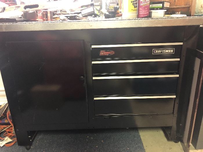 Craftsman wirk bench and cabinet with drawers and a cupboard