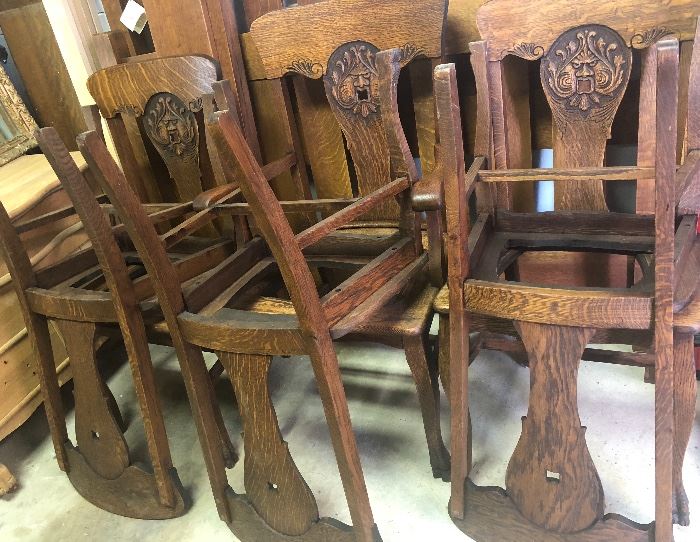 American quartersawed oad with carved face back chairs