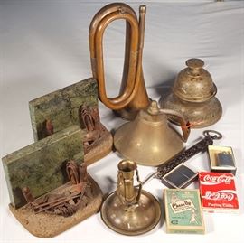brass bell, trumpet, lighters, boat bookends,vintage humor playing cards,&nbsp; etc