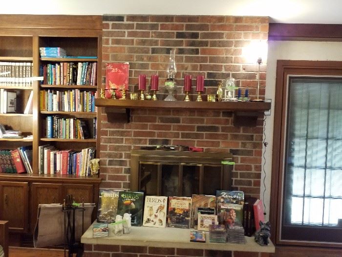 Candles, brass, books, fireplace tools 