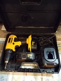 Ryobi electric drill with charger