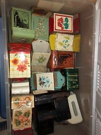 Vintage tin match boxes, wall mounted