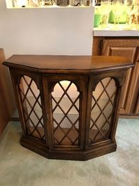 Light wood curio cabinet