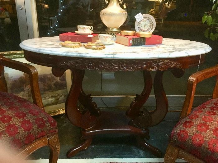 Large Oval Shaped, Carved Mahogany Table with Marble Top