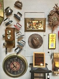 Vintage Sad Irons, Leather Hat, Coo-Coo Clock, Large Black & Red Wall Clock, and we have just taken in some vintage bar memorabilia & signs