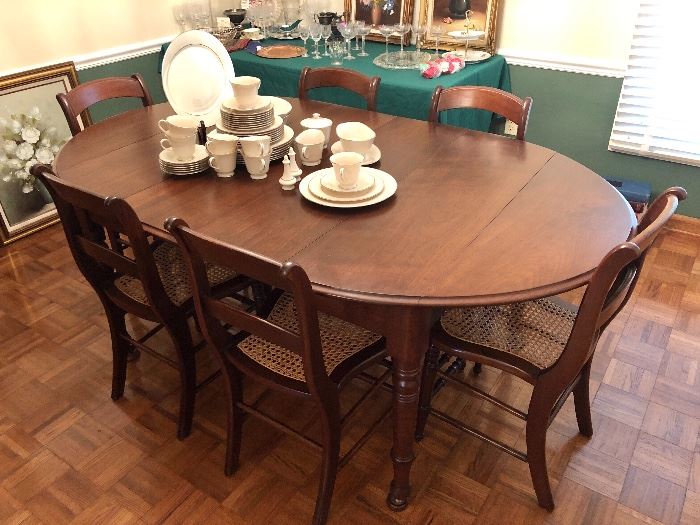 Antique Table with leafs and pads and 6 Chairs