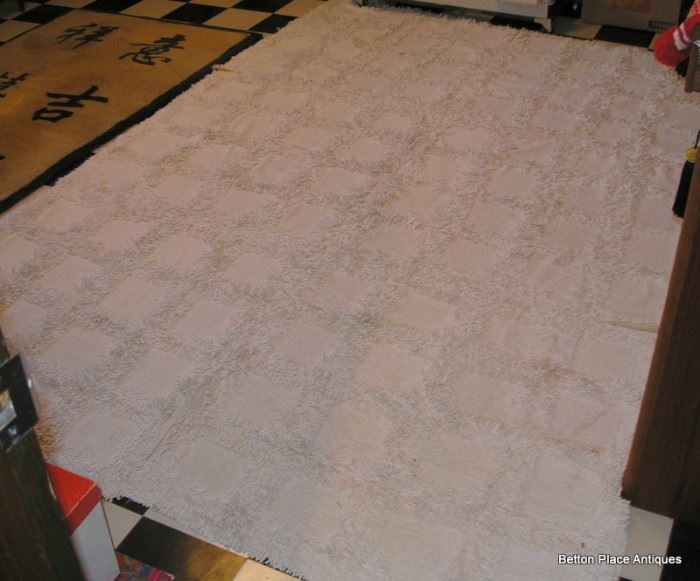 White floor rug
