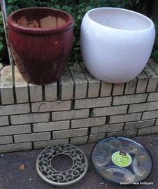 Planters and More to come, there are two Gainey California Planters in the home , both white