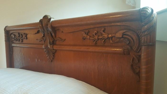 close-up of Tiger oak carved bed