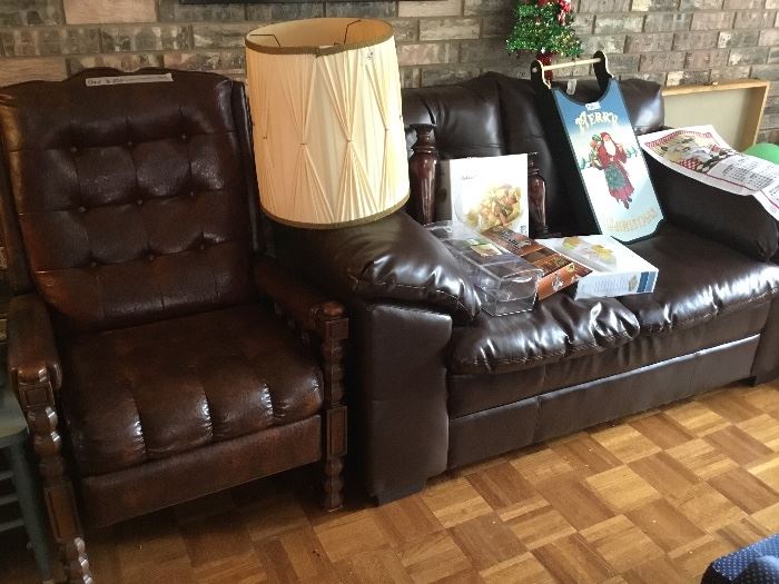 Large vintage chair and a leather loveseat in Black