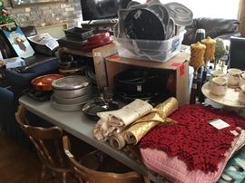 Cookware of all kinds, 4 oak chairs, placemats, etc