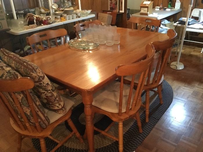 Dining room oak table with 6 chairs; nice set of glasses and large platter
