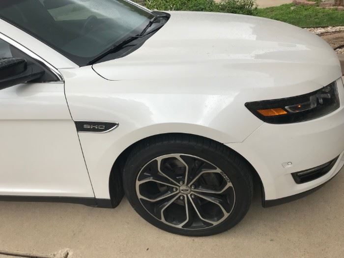 Rare Mint Condition 2013 Ford Taurus SHO (Super High Output) Only 3,000 made that year. First year of the new body style. Minumum sealed bid of $10,000. Highest sealed bid over that wins.Taking bids Friday all day and Sat until noon. Winner will be notified after noon and will be required to give a $500 non refundable deposit. Payment in Cash only due no later than Monday.