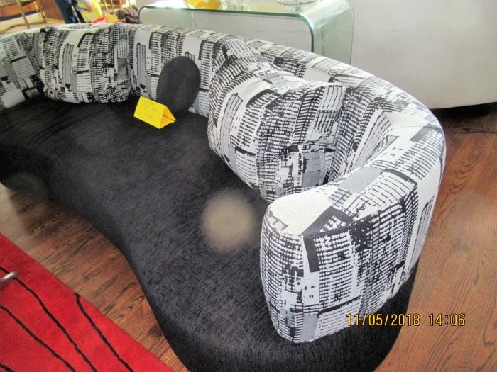 BUY IT NOW,  BUY IT NOW,  black and grey curved sofa 8 feet,  $975.00   note no damage the spots are the camera flash