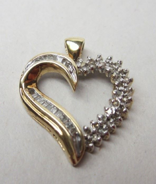 10k gold heart pendant with baguette and single cut channel set diamonds. 2.6 grams
